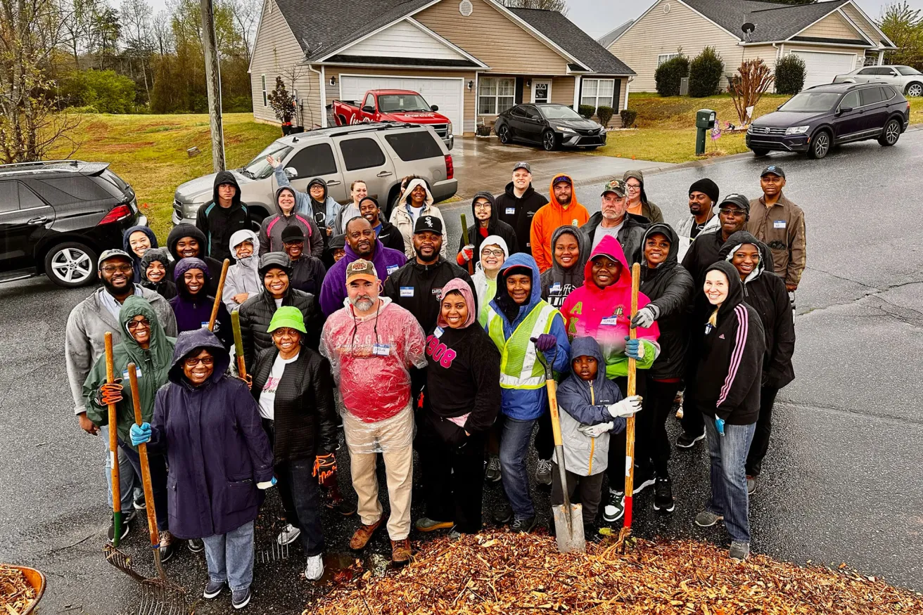 group of people planting trees