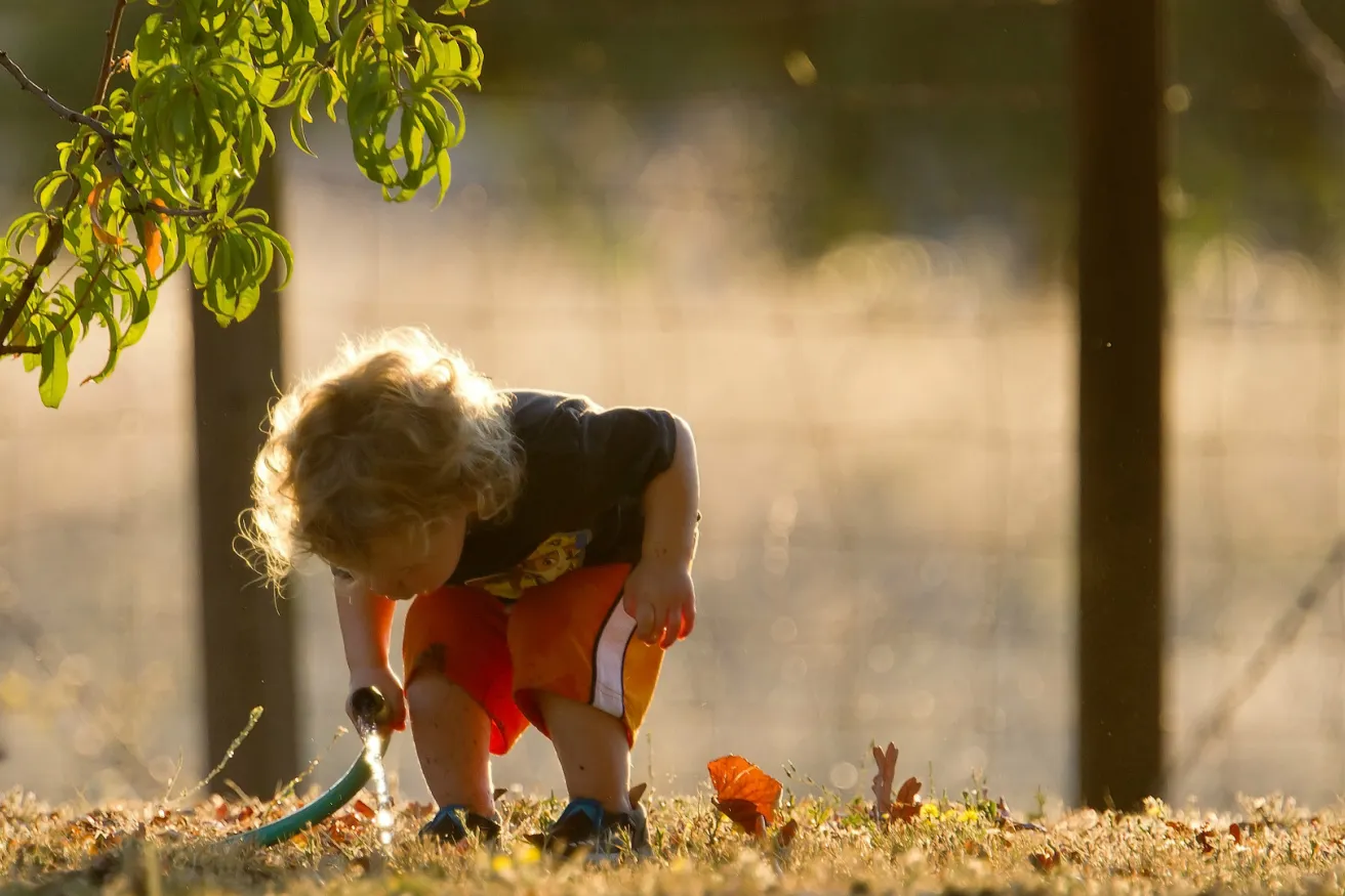 Media Name: little-boy-with-hose.jpg