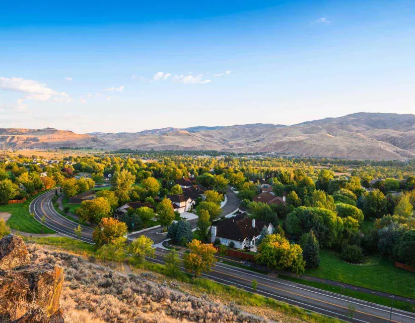 Aerial view of Boise Hills with mountains in background